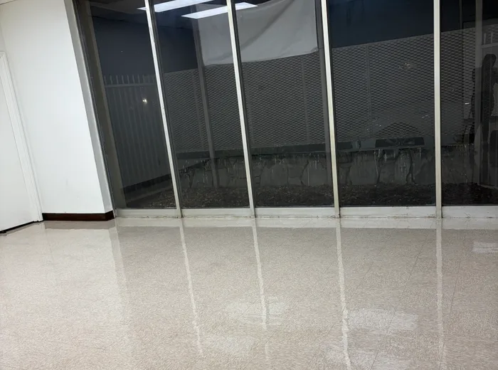 Restored high-gloss floor finish by Clean Bright Portland